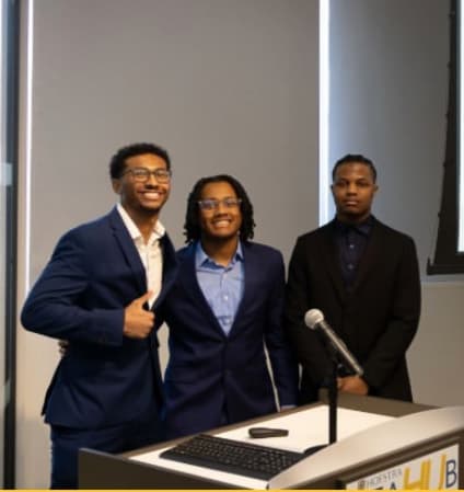 Corely team members Gabriel Stout, Matthew Stewart, and Christian Bramwell together after presenting at Hofstra